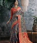 Blue woven banarasi silk saree with blouse