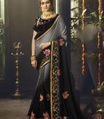 Black embroidered art silk saree with blouse