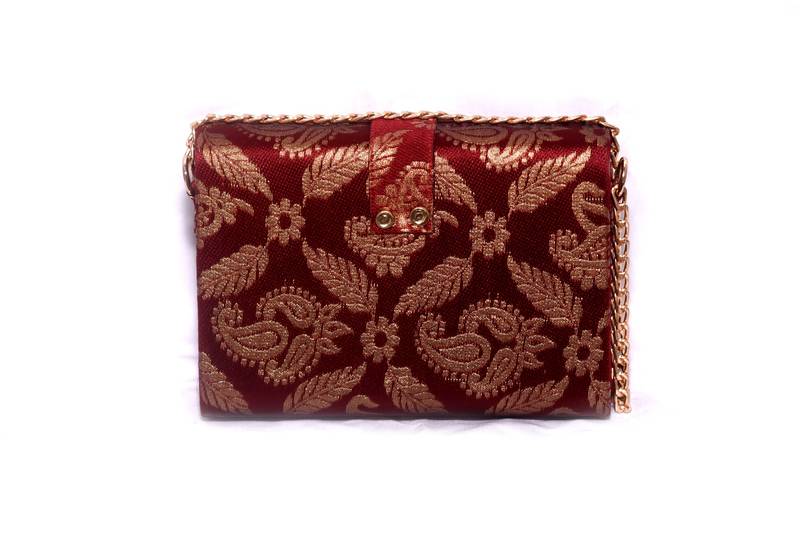 Banarasi Silk & Jute Made Maroon Color Clutch With Hand Zari, Embroidery & Stone Embellishemnt Work