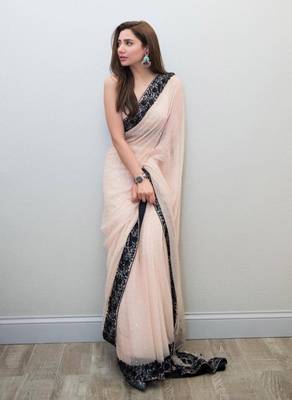 Light peach colour  embroidered georgette saree with blouse 1