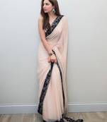 Light peach colour  embroidered georgette saree with blouse