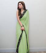 Parrot green embroidered georgette saree with blouse