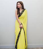 Light yellow embroidered georgette saree with blouse