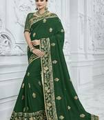Dark green embroidered art silk saree with blouse