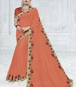 Orange embroidered georgette saree with blouse