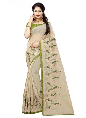 Cream embroidered organza saree with blouse 1