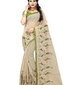 Cream embroidered organza saree with blouse