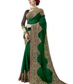 Dark green embroidered georgette saree with blouse