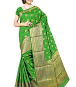 Green woven silk blend saree with blouse