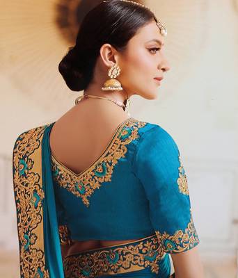 Turquoise embroidered silk saree with blouse 3