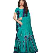 Turquoise printed crepe saree with blouse
