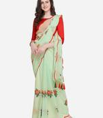 Parrot green embroidered georgette saree with blouse