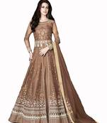 Chiku embroidered net salwar with dupatta