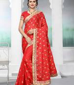 Red embroidered silk saree with blouse