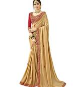 Beige embroidered shimmer saree with blouse