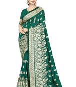 Dark green embroidered art silk saree with blouse