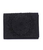 Self embroidery clutch