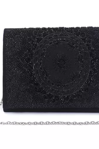 Self embroidery clutch