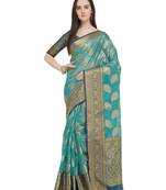 Turquoise woven organza saree with blouse