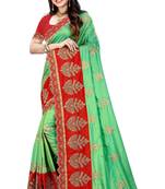Light green embroidered silk saree with blouse
