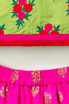 Green printed top with pink foil print dhoti