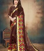 Brown embroidered georgette saree with blouse