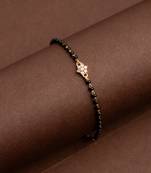 Black bead bracelet with diamond flower one gram gold