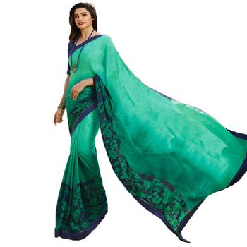 Green printed georgette saree with blouse 1