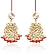 White Kundans And Red Beads Chandelier Earrings