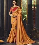 Orange embroidered silk cotton saree with blouse