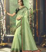 Green embroidered organza saree with blouse