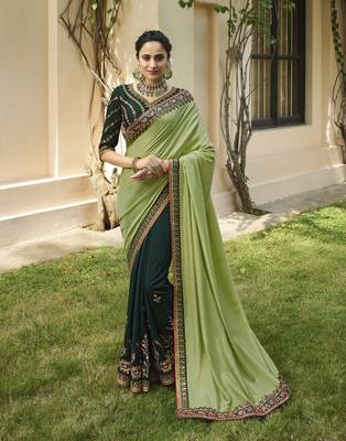 Green embroidered silk blend saree with blouse 1