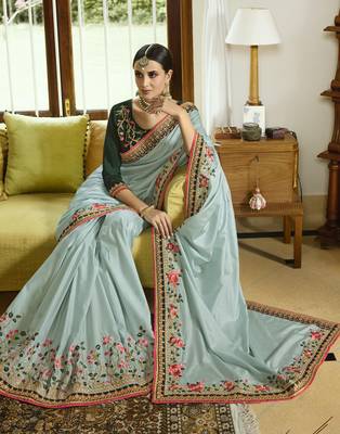 Light green embroidered silk blend saree with blouse 2