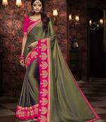 Green embroidered silk blend saree with blouse