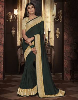 Green embroidered silk blend saree with blouse 1
