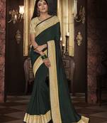 Green embroidered silk blend saree with blouse