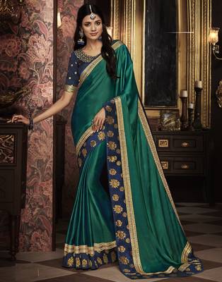 Green embroidered silk blend saree with blouse 1