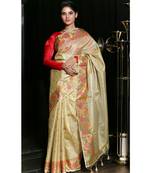 Yellow hand woven Tissue saree with blouse