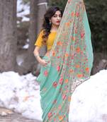 Pista Green Color Kashmiri Aari Work Embroidered Saree Enriched With Floral Paisley Pattern