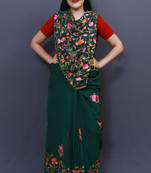 Bottle Green Colour Saree With Dense Aari Jaal On Pallu And Flowral Motifs