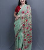 Sea Green Colour Saree With Dense Aari Jaal On Pallu And Flowral Motifs
