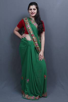 Green Colour Saree With Aari Work Border And Bold Paisleys Make The Saree Unique And Attractive 2