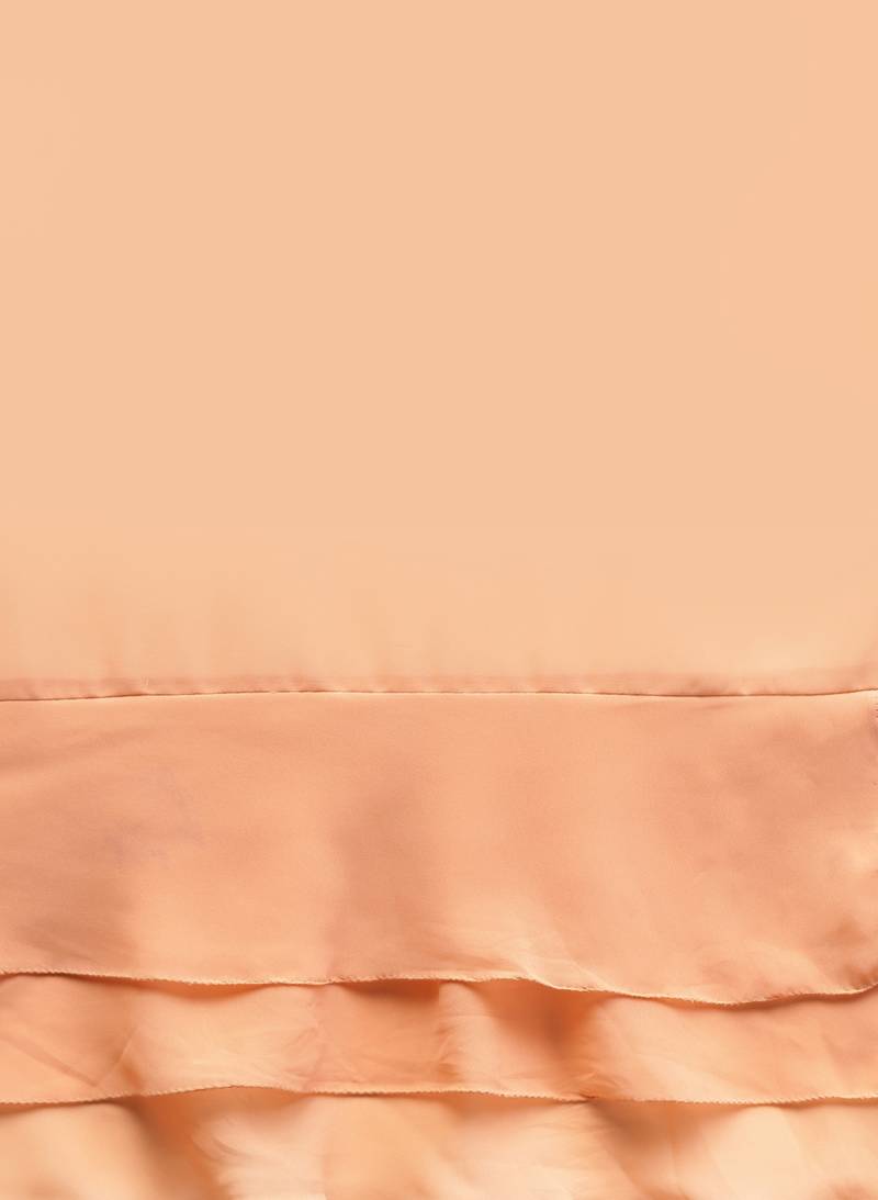 Inddus Peach Georgette Solid Ruffle Saree