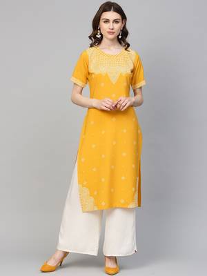 Yellow printed crepe kurtas-and-kurtis 1