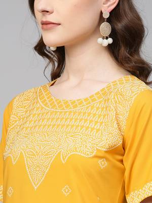 Yellow printed crepe kurtas-and-kurtis 2