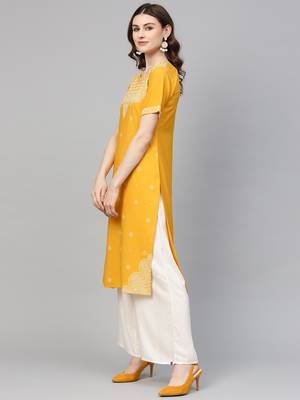 Yellow printed crepe kurtas-and-kurtis 3