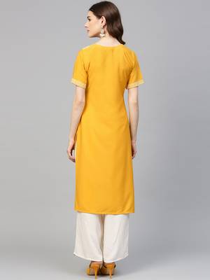 Yellow printed crepe kurtas-and-kurtis 4