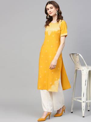 Yellow printed crepe kurtas-and-kurtis 5