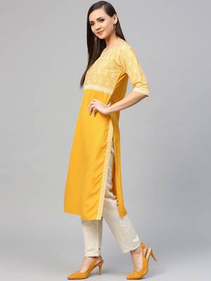 Yellow printed crepe kurtas-and-kurtis 3