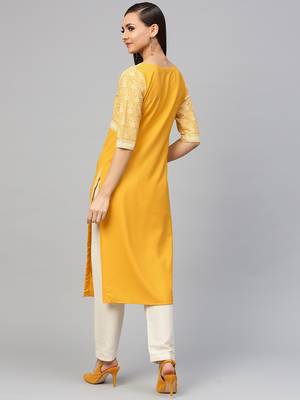 Yellow printed crepe kurtas-and-kurtis 4